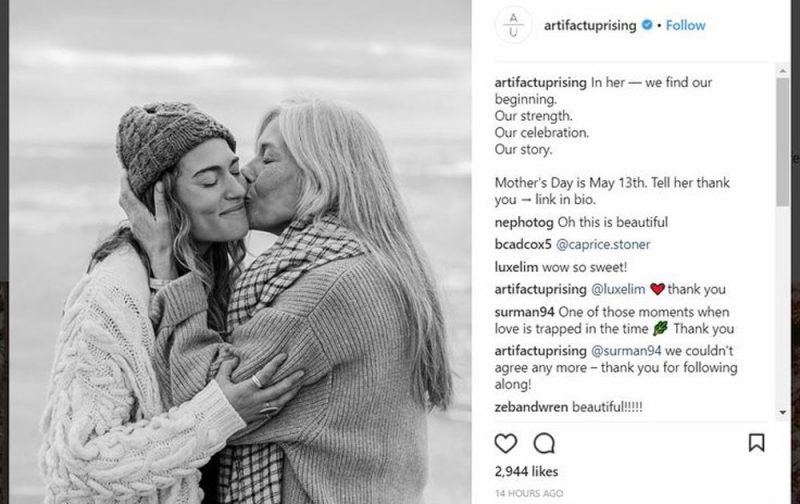 A person's hands writing New Year's goals in a journal, an inspirational image for Instagram captions about new beginnings in 2025.